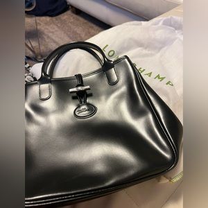 New without tags, long champ, black purse.